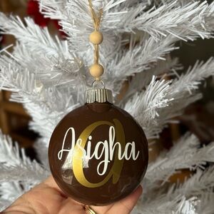 Festive Brown Ornament with Gold Accents
